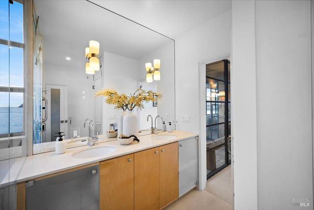 a bedroom with bed and a fireplace