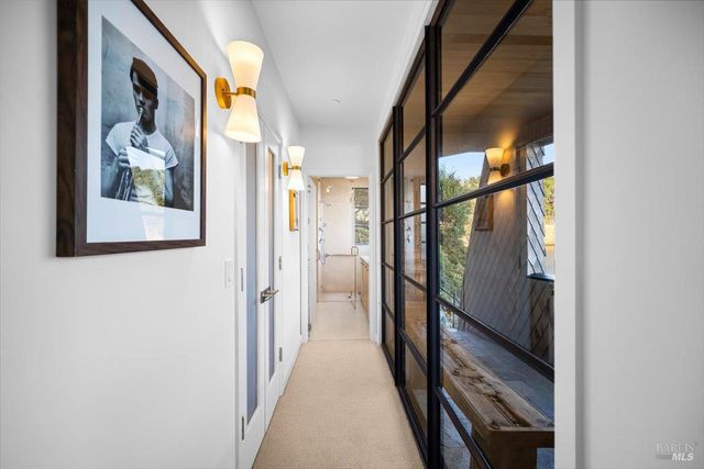 a view of a dining room with furniture and window