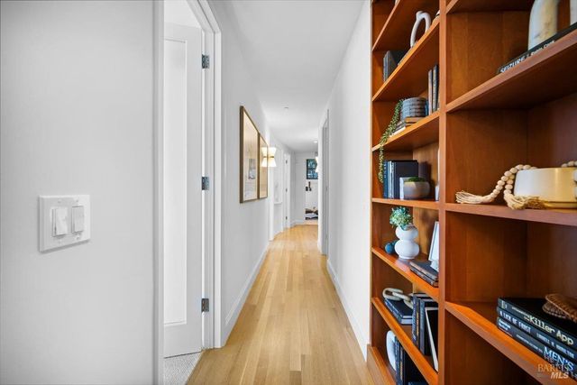 a bathroom with a toilet a sink and a mirror