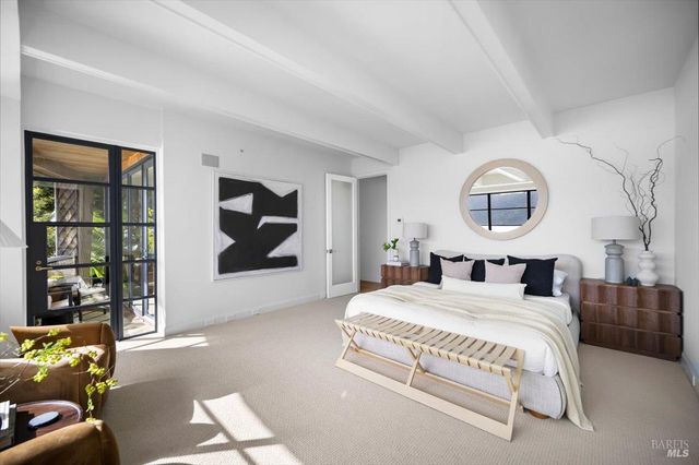 a kitchen with a table chairs and a stove