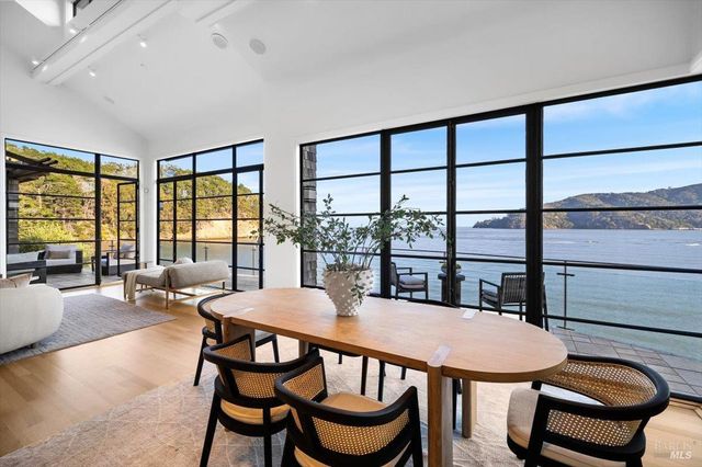 a bedroom with a bed and a mirror