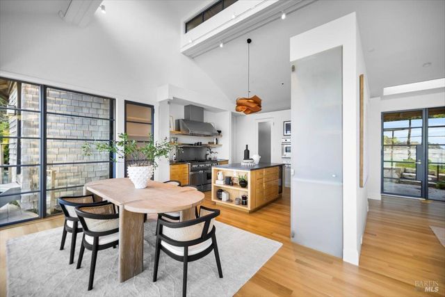 a living room with furniture or outdoor view and a large window