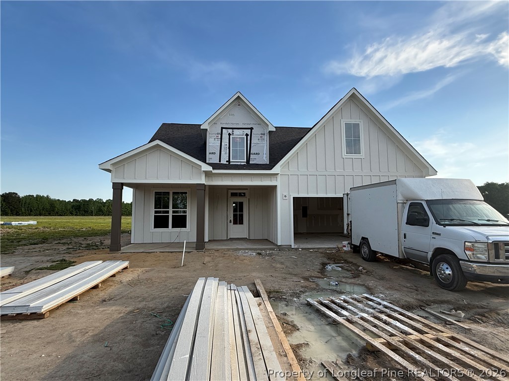 5076 Ross West Road Dunn, NC 28334 - Photo 2 of 8 a front view of a house with barbeque yard
