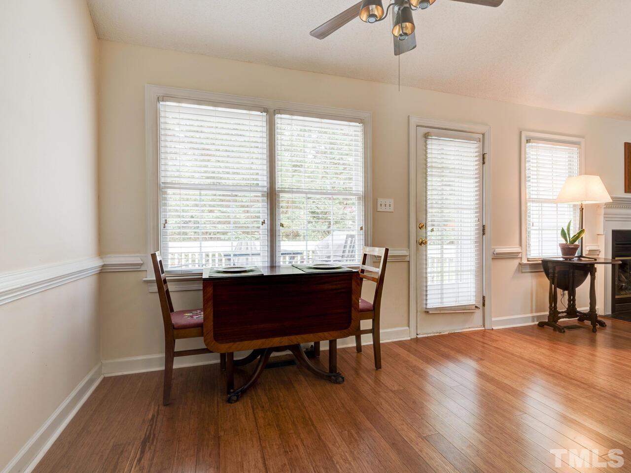 12108 Amoretto Way Raleigh, NC 27613 - Photo 14 of 40 a view of a workspace with furniture and a window