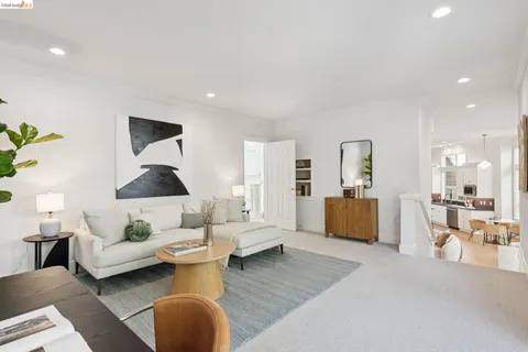 a bedroom with a large bed and a couch