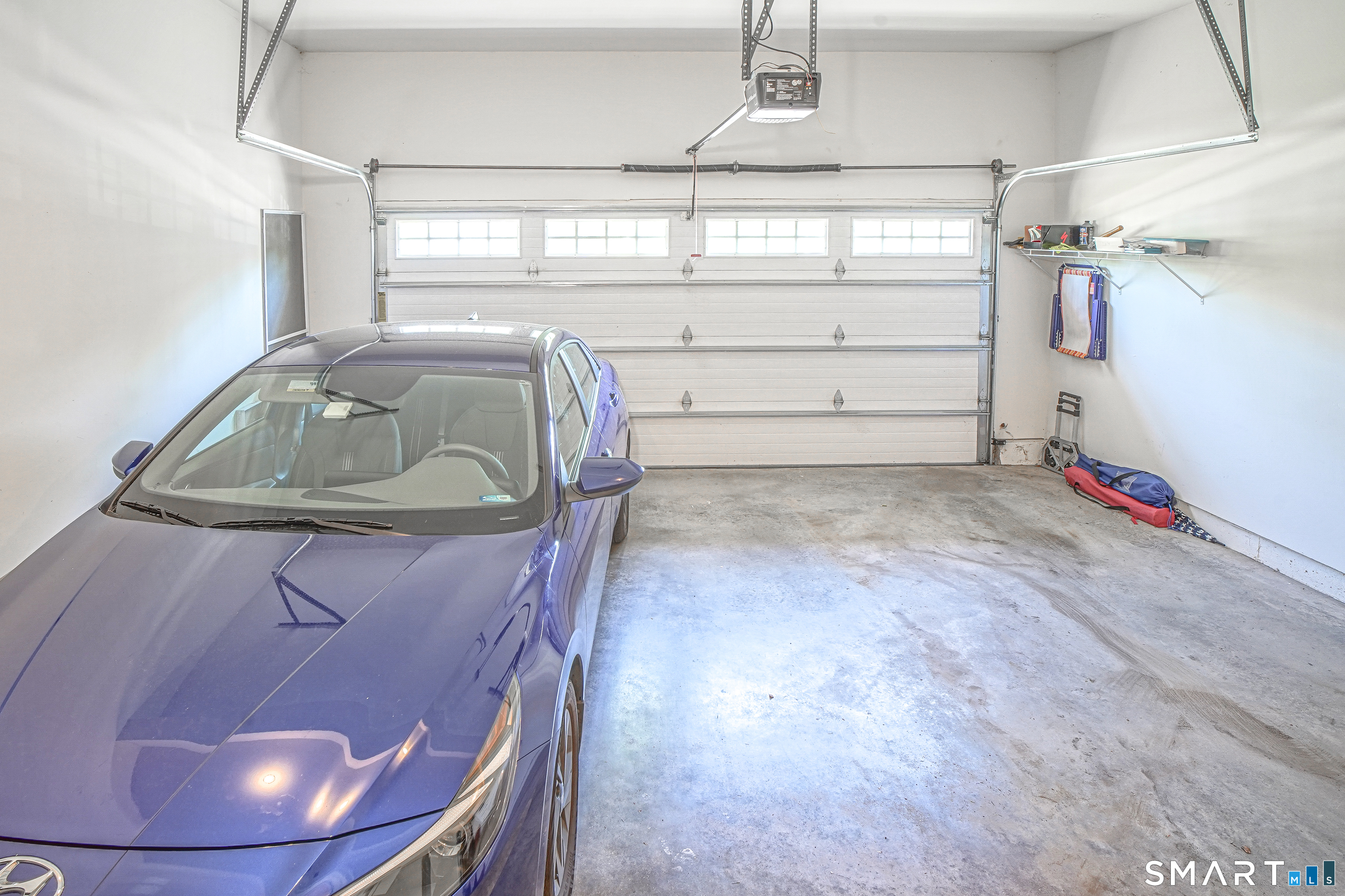 6 Lilac Lane, Unit 6 Prospect, CT 06712 - Photo 12 of 40 2-car attached garage with electric door opener.