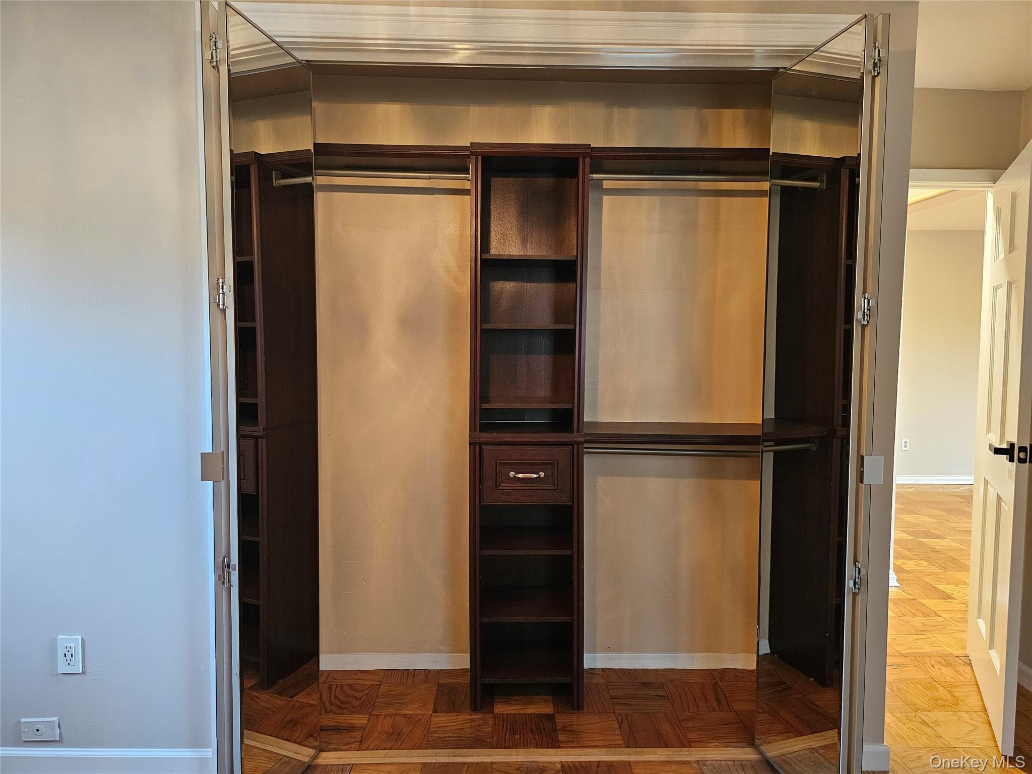 2261 Palmer Avenue, Unit 3C New Rochelle, NY 10801 - Photo 15 of 23 a view of walk in closet with empty racks