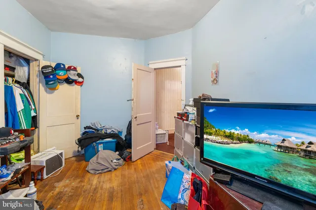 a room with gym equipment and a large window
