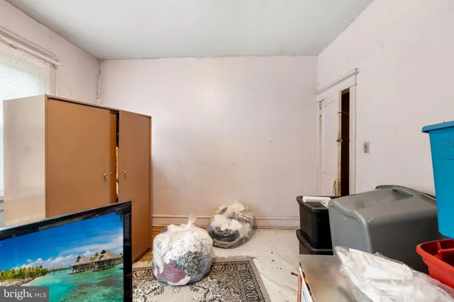 a room with furniture and wooden floor