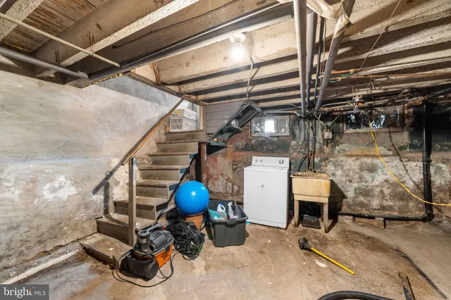 a view of a chairs and table in a patio