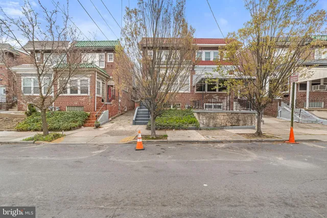 a view of a house with a street