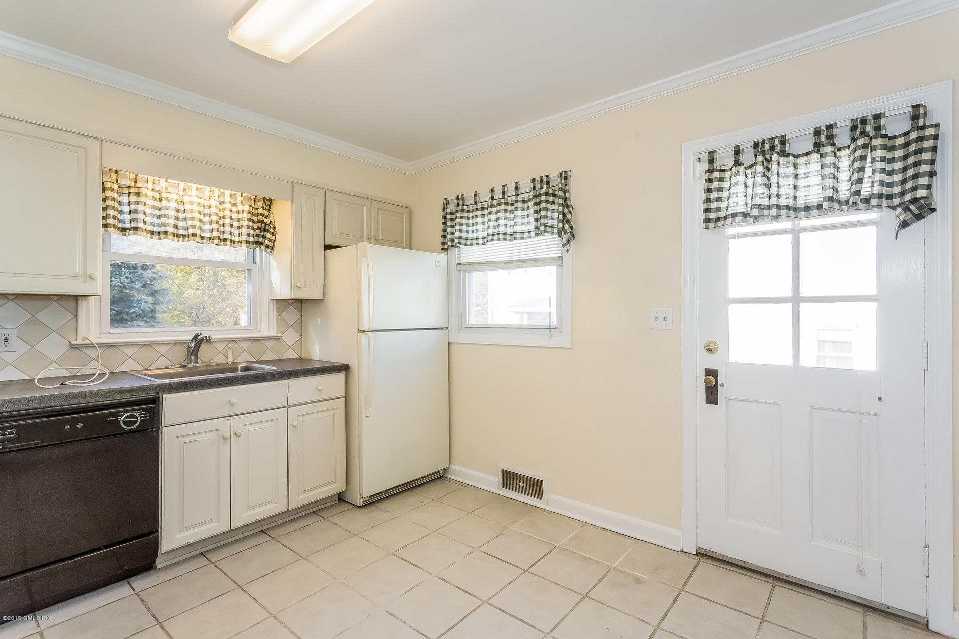 34 Wescott Street Riverside, CT 06878 - Photo 12 of 26 a kitchen with appliances cabinets and a sink
