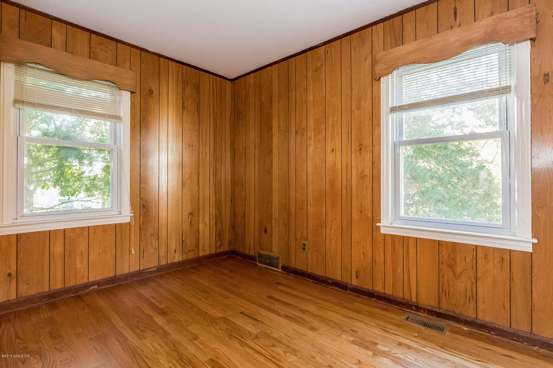 34 Wescott Street Riverside, CT 06878 - Photo 13 of 26 an empty room with wooden floor and windows