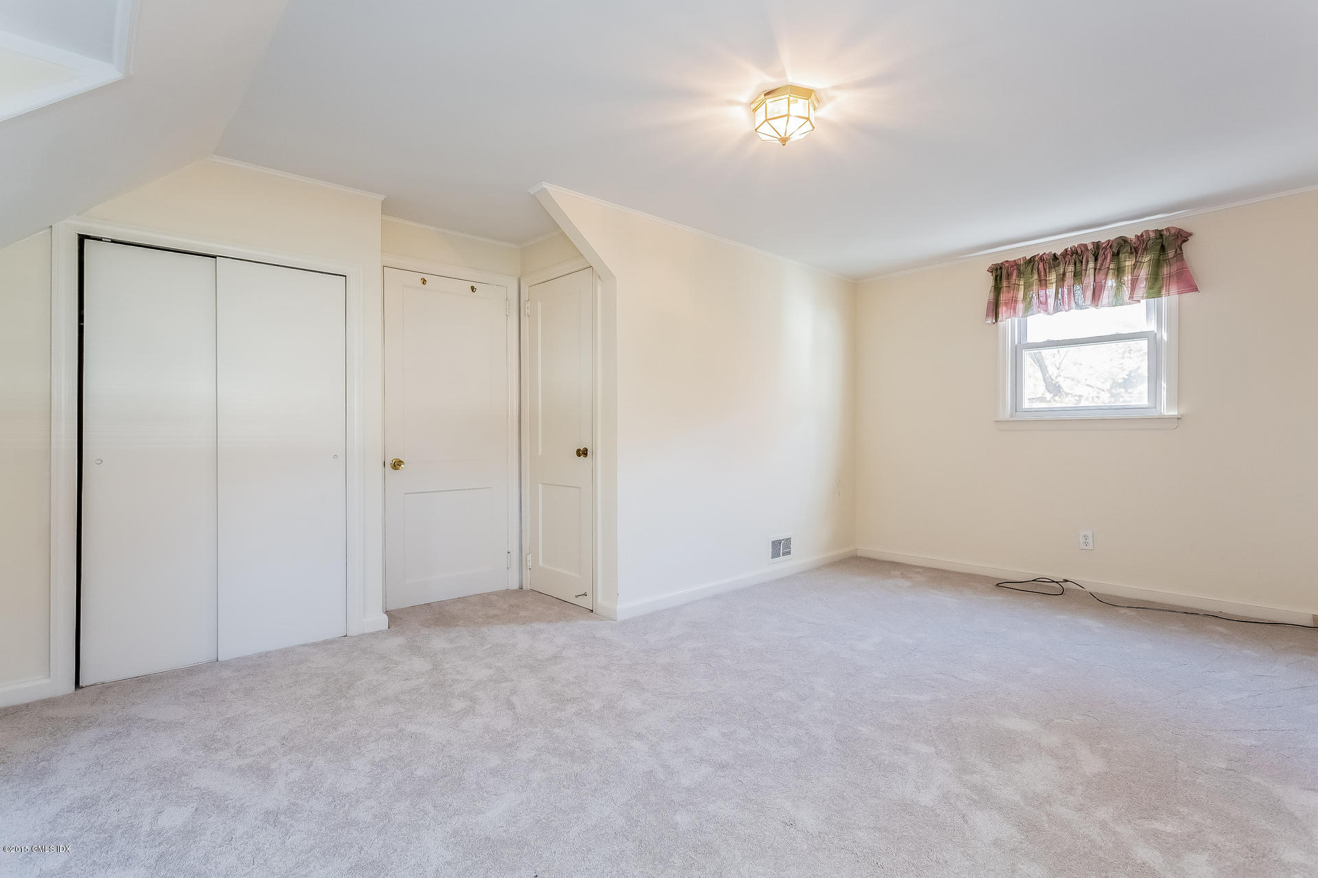 34 Wescott Street Riverside, CT 06878 - Photo 17 of 26 a view of an empty room with a window