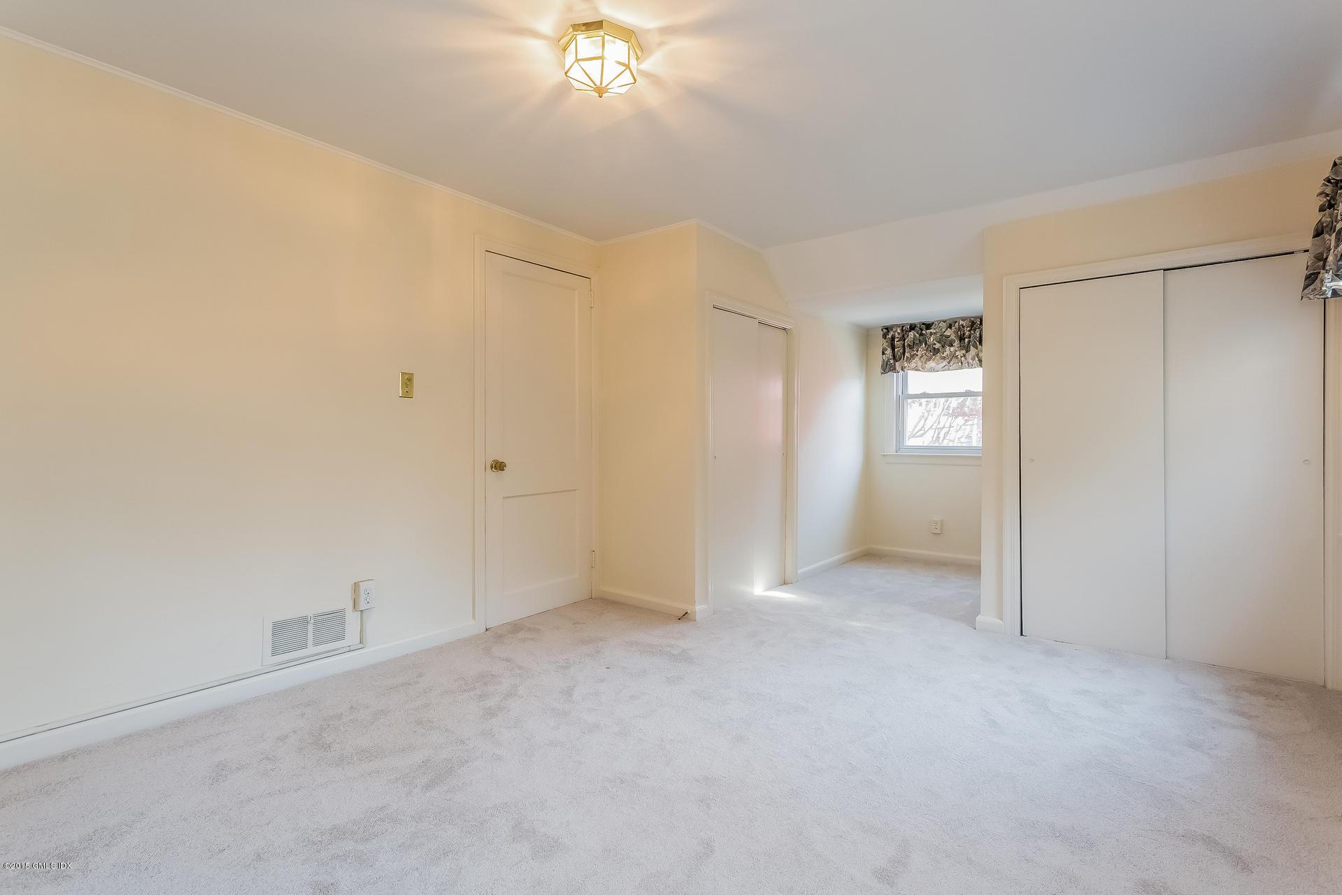 34 Wescott Street Riverside, CT 06878 - Photo 20 of 26 a view of an empty room with a window