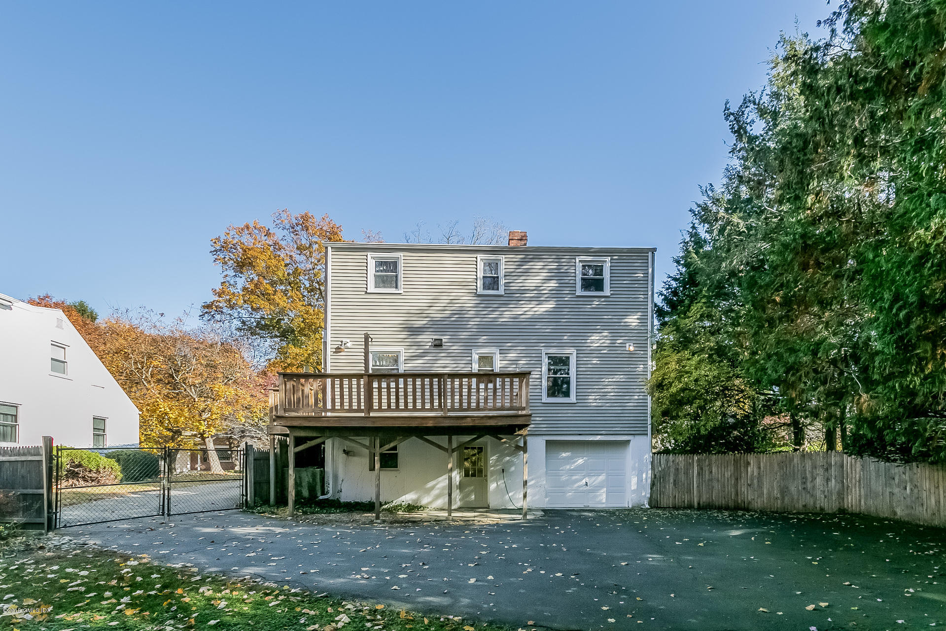 34 Wescott Street Riverside, CT 06878 - Photo 25 of 26 a view of a house with a yard and furniture