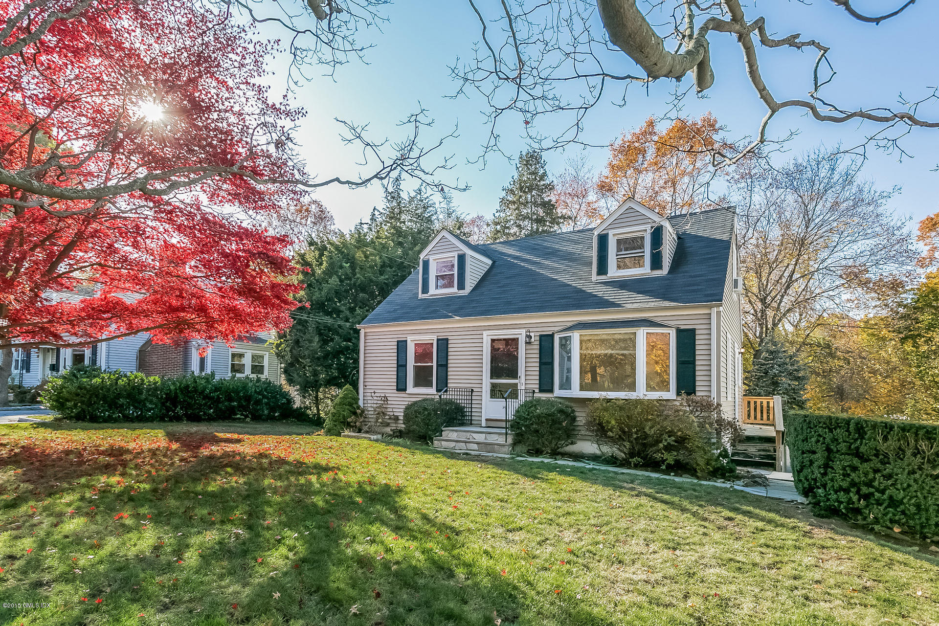 34 Wescott Street Riverside, CT 06878 - Photo 3 of 26 a front view of a house with garden