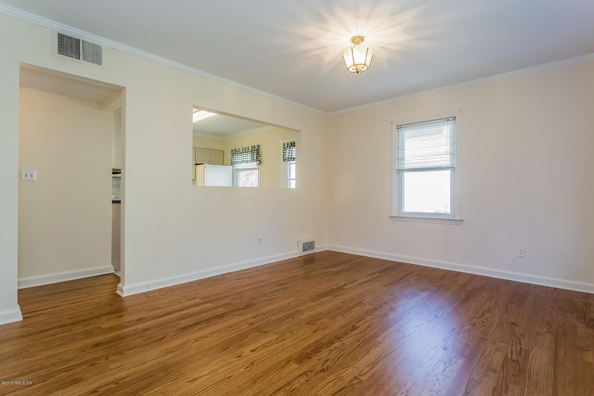 34 Wescott Street Riverside, CT 06878 - Photo 6 of 26 a view of empty room with wooden floor and fan