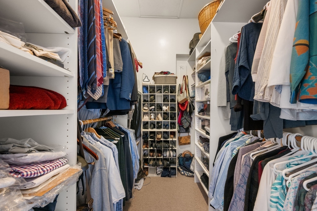 72 Mt Vernon Street, Unit 2A Boston, MA 02108 - Photo 17 of 25 a view of walk in closet with clothes and shoes