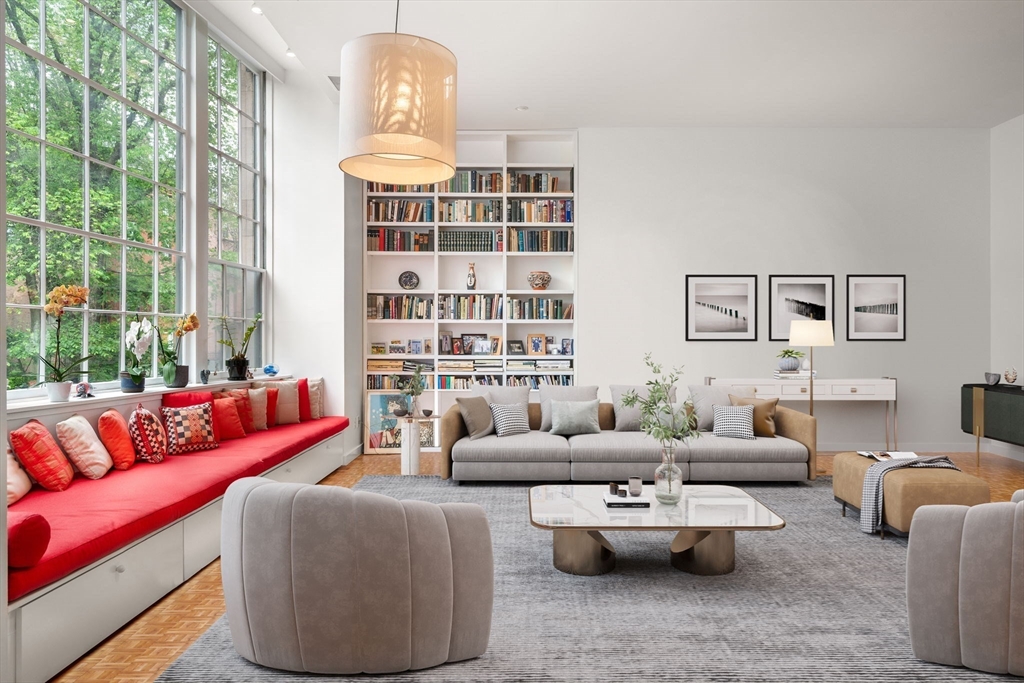 72 Mt Vernon Street, Unit 2A Boston, MA 02108 - Photo 2 of 25 a living room with furniture and a chandelier