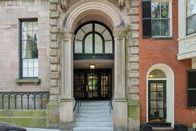 a view of entrance gate of a house