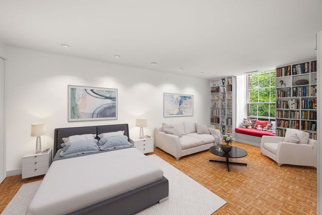 72 Mt Vernon Street, Unit 2A Boston, MA 02108 - Photo 4 of 25 a bedroom with furniture and a large window