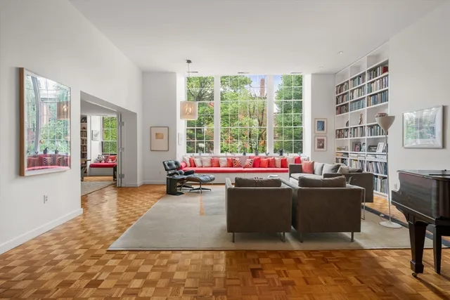 a living room with furniture and window