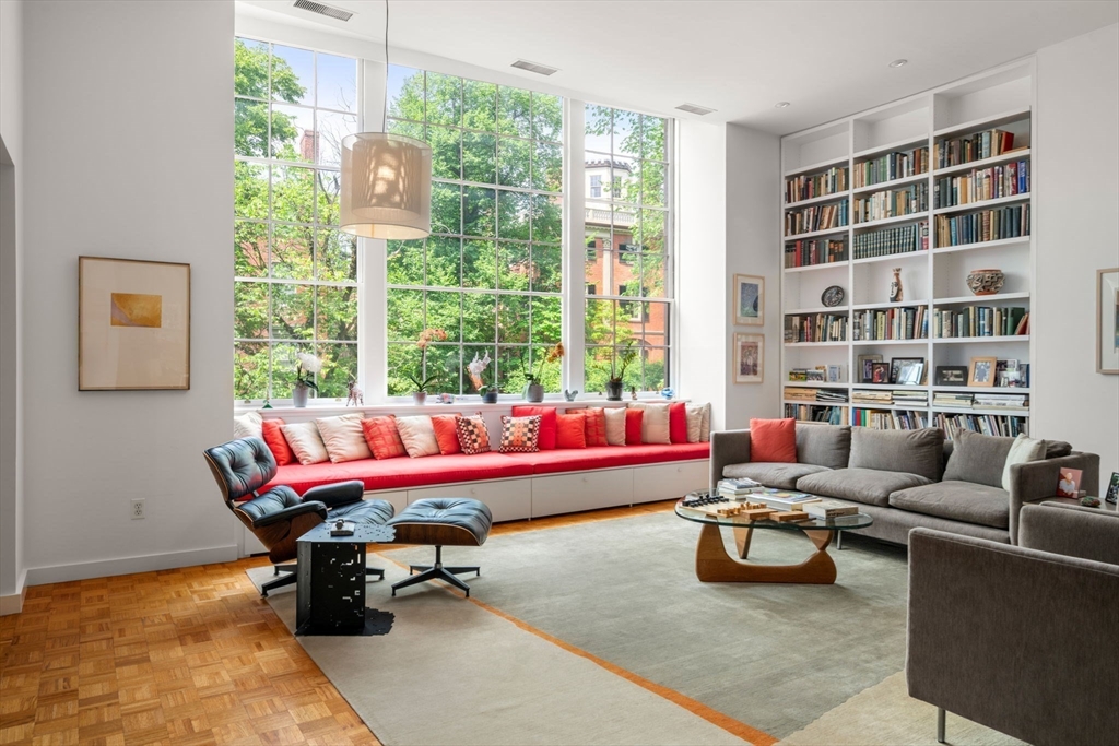 72 Mt Vernon Street, Unit 2A Boston, MA 02108 - Photo 7 of 25 a living room with furniture and a large window