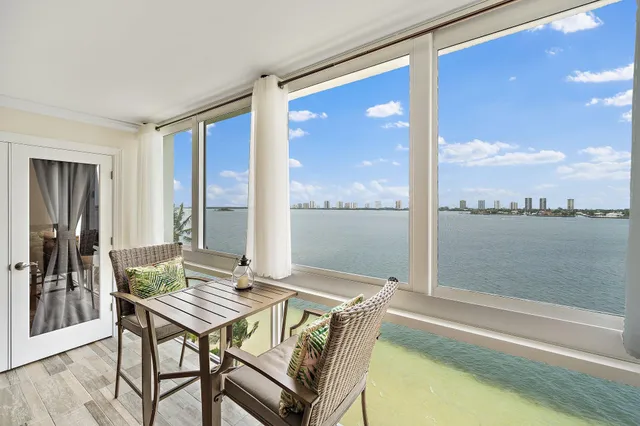 a view of a living room and dining room