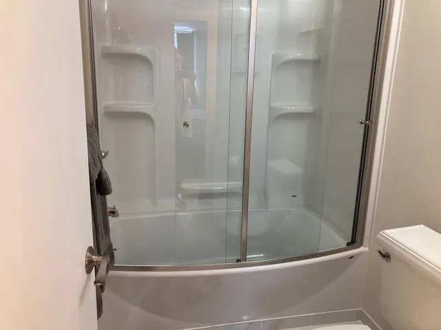 a room with furniture and flat screen tv