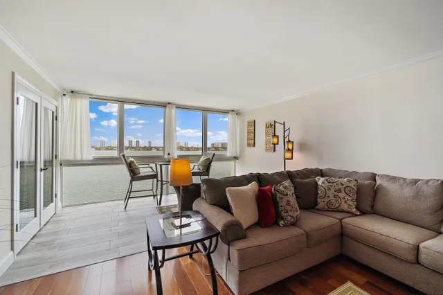 a living room with furniture and a table