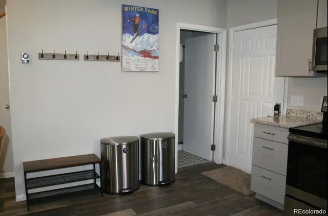 a view of room with window and wooden floor