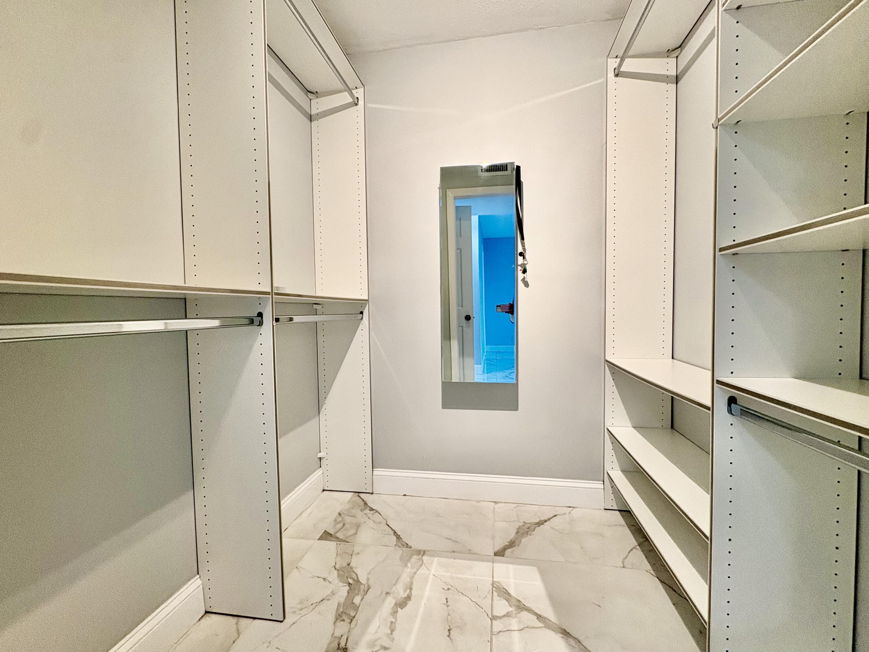 5700 Northwest 2nd Avenue, Unit 311 Boca Raton, FL 33487 - Photo 21 of 33 MASTER WALKING CLOSET