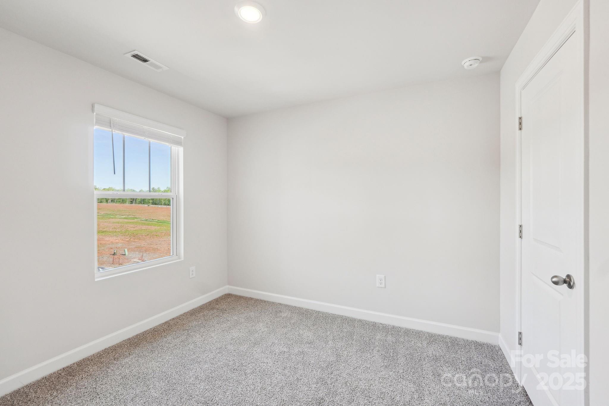 1516 31st Street Northeast Conover, NC 28613 - Photo 11 of 18 an empty room with a window