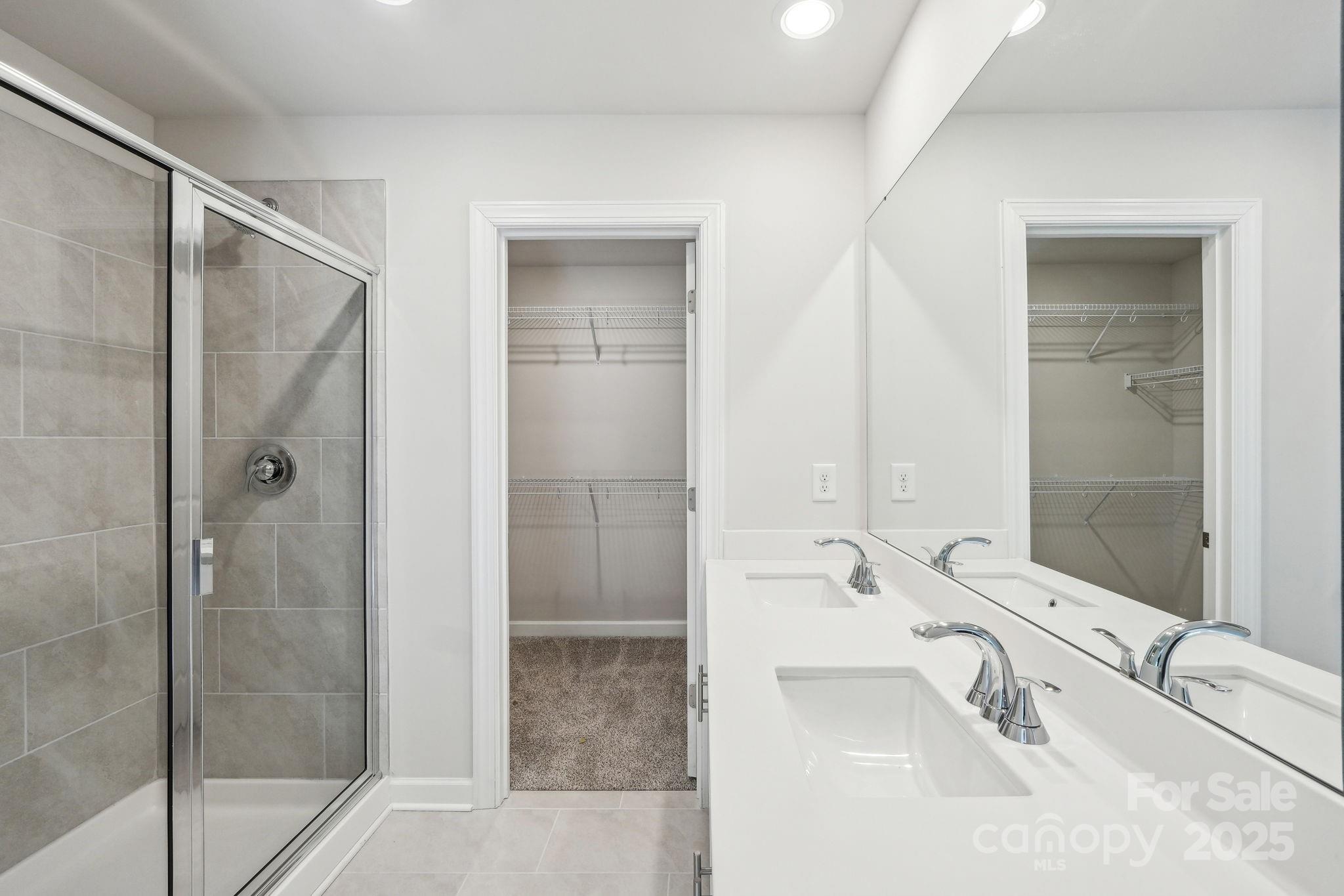 1516 31st Street Northeast Conover, NC 28613 - Photo 17 of 18 a bathroom with a tub sink and mirror