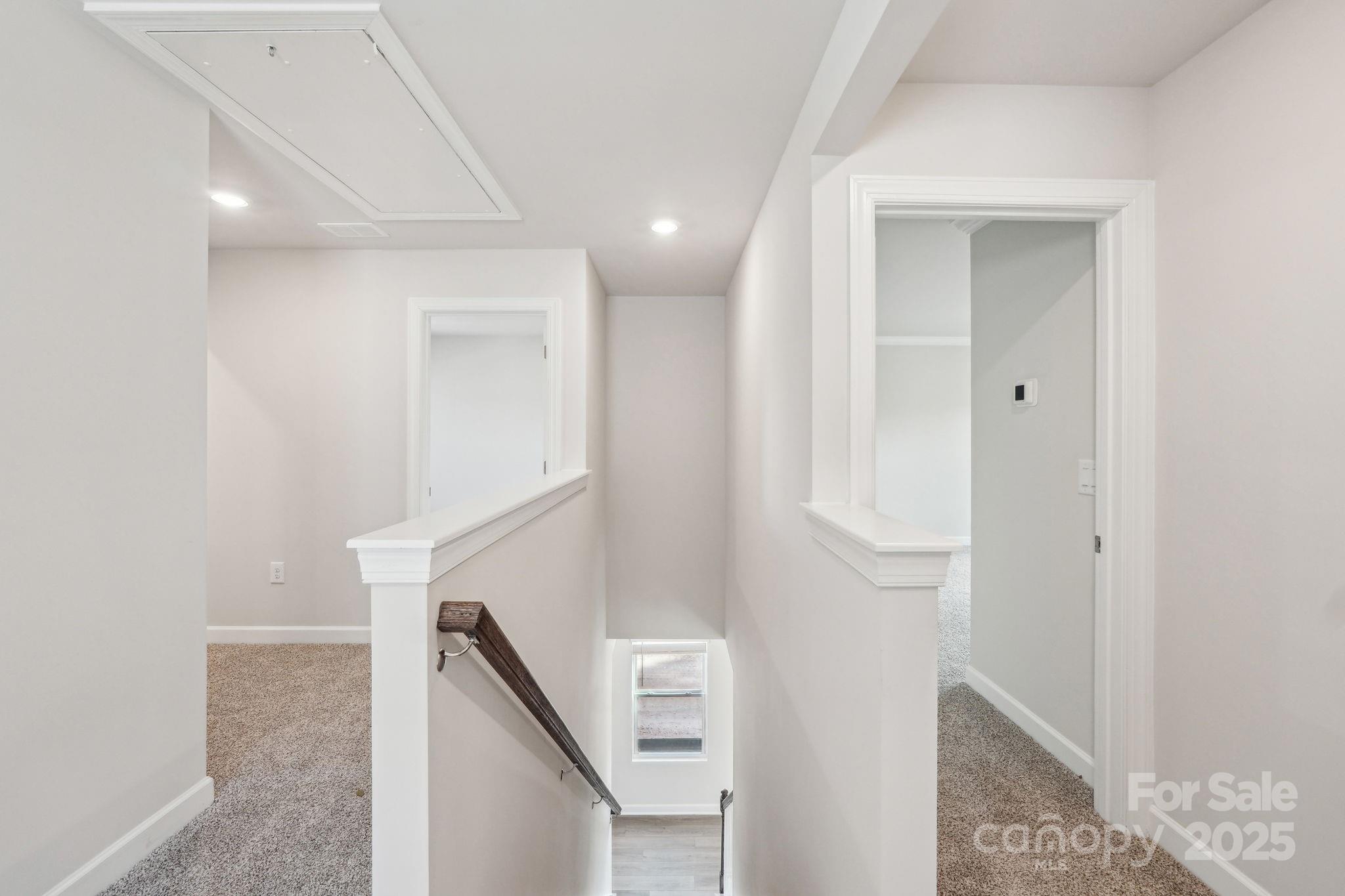 1516 31st Street Northeast Conover, NC 28613 - Photo 9 of 18 a view of staircase with white walls