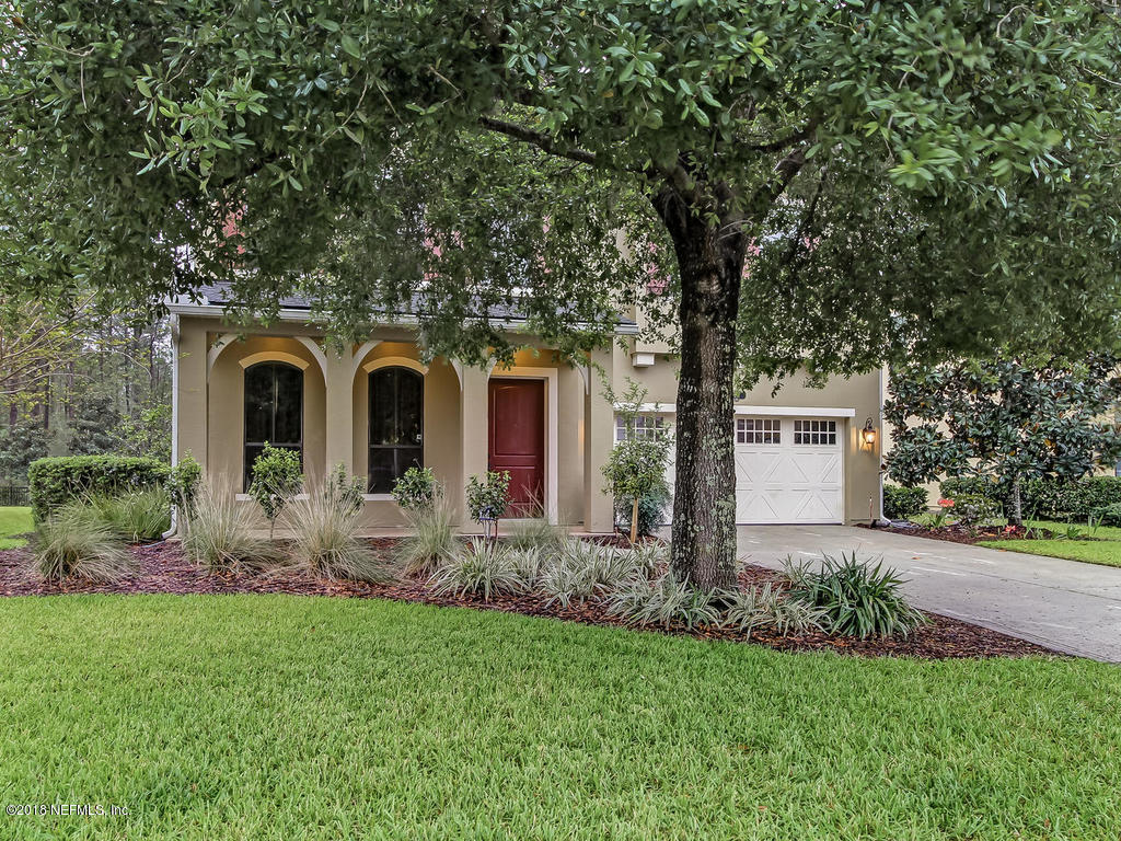 213 North Saxxon Road St. Augustine, FL 32092 - Photo 8 of 88 front view of house with a yard