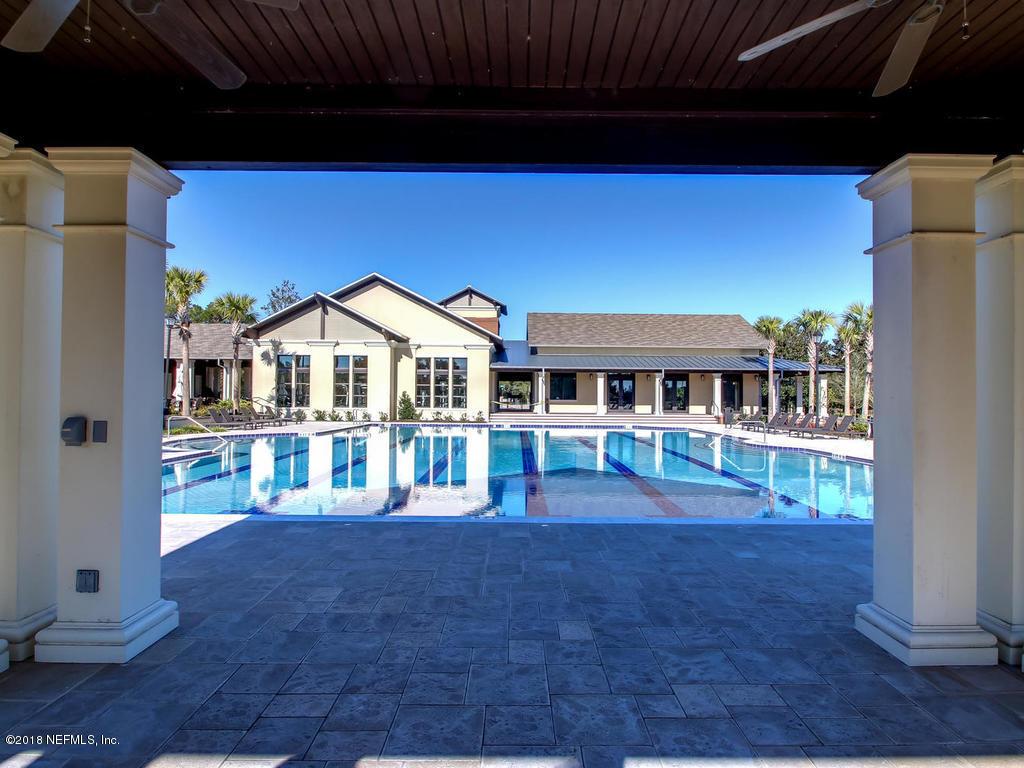 213 North Saxxon Road St. Augustine, FL 32092 - Photo 83 of 88 a front view of a house with a yard