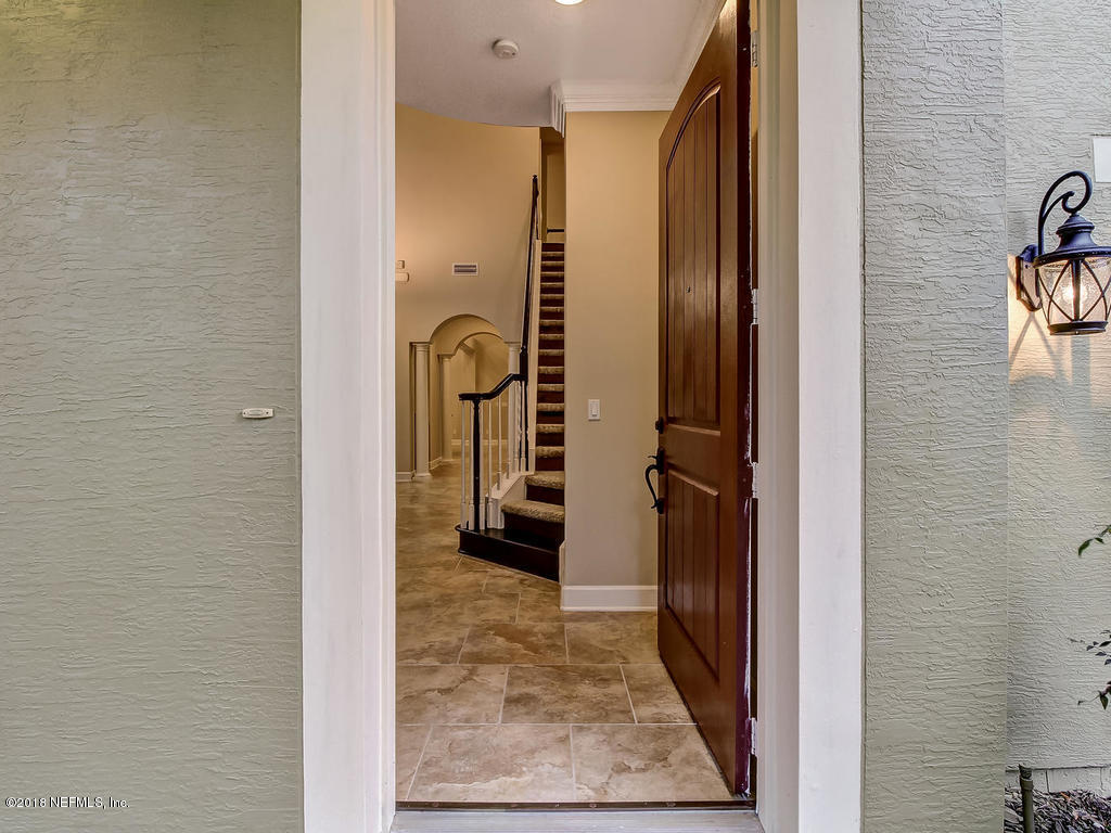 213 North Saxxon Road St. Augustine, FL 32092 - Photo 10 of 88 a view of a bathroom from a hallway