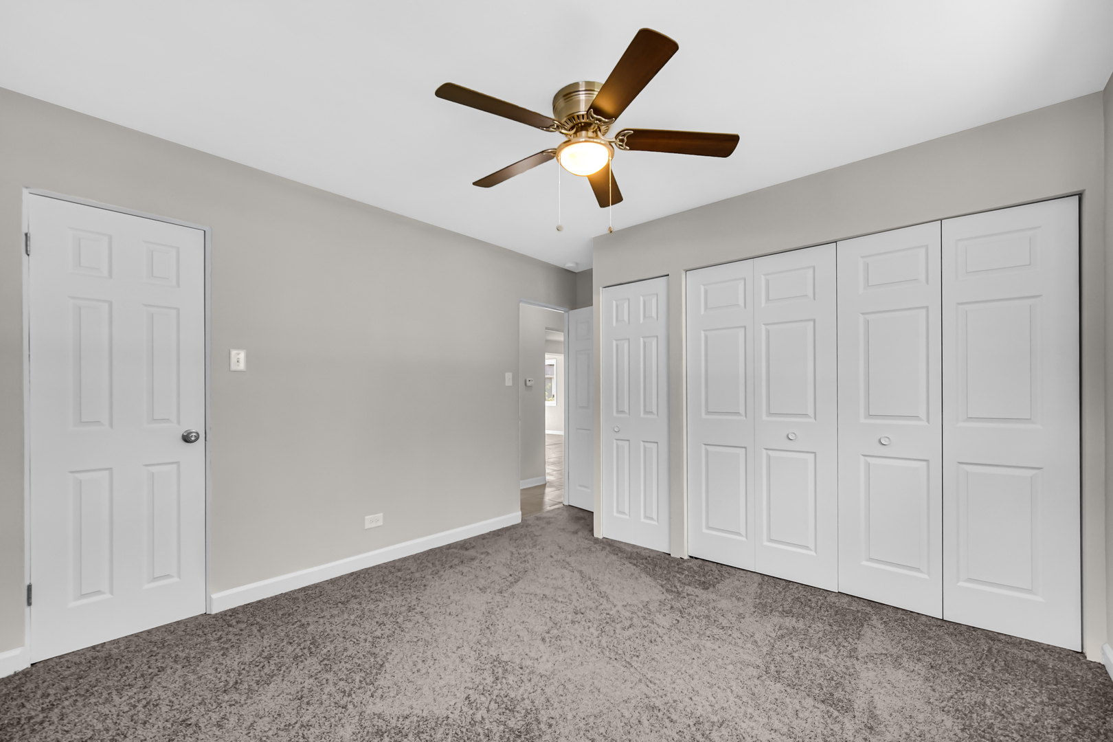 17137 Chicago Avenue Lansing, IL 60438 - Photo 9 of 11 an empty room with ceiling fan