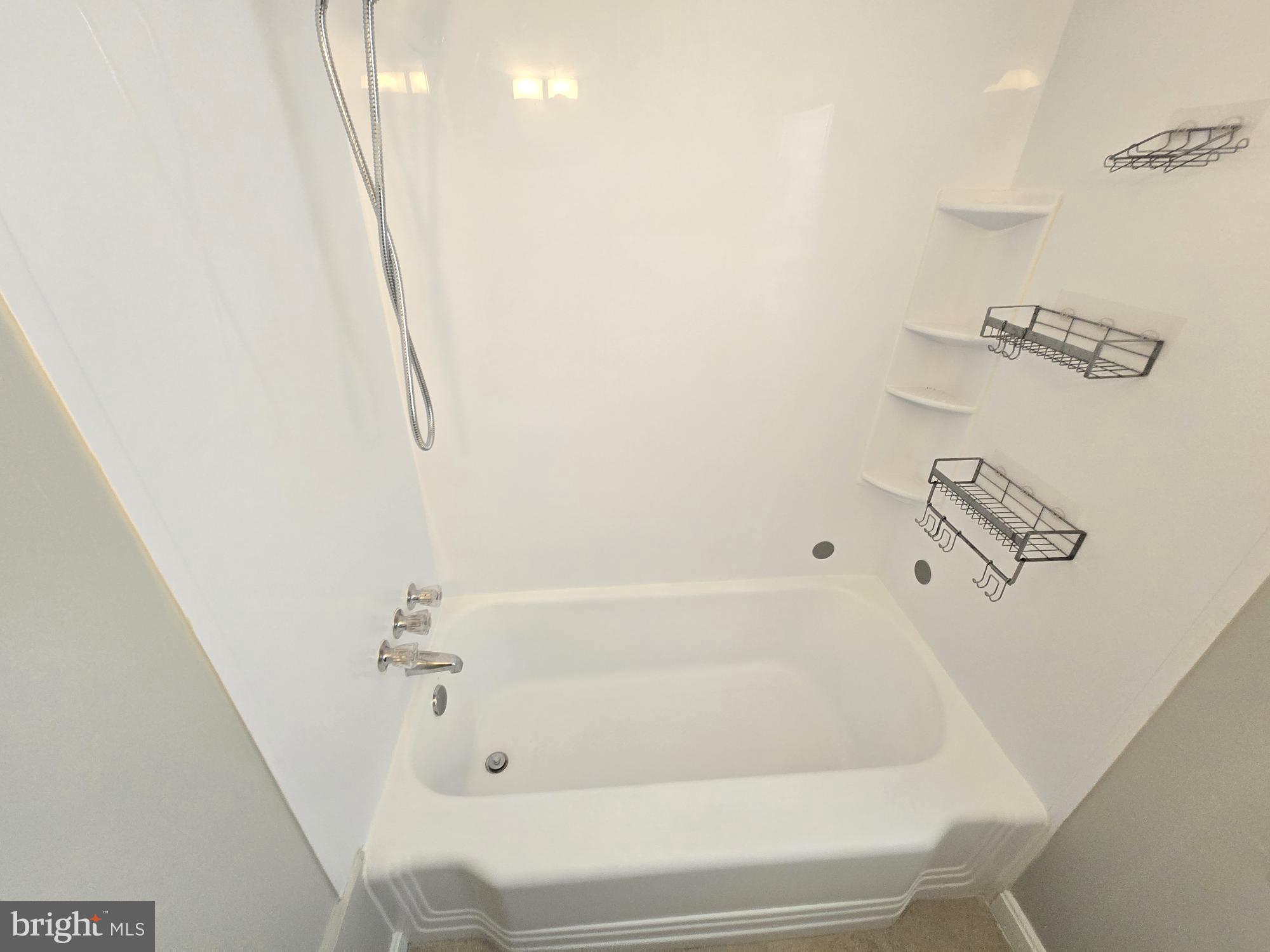 1225 Cochran Avenue Baltimore, MD 21239 - Photo 13 of 22 a bathroom with a bathtub