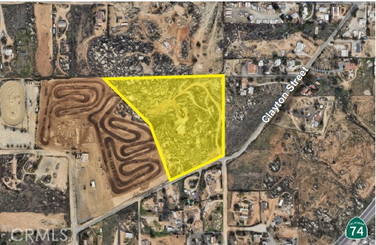 0 Clayton Street Perris, CA 92570 - Photo 2 of 3 a sign that is on the wall of a building