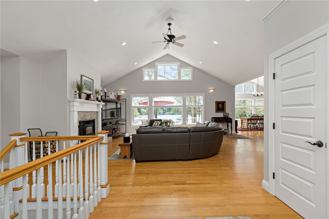77 Raymonds Point Road Coventry, RI 02816 - Photo 17 of 50 View into great room as you enter the house. Stairs to the lower level.
