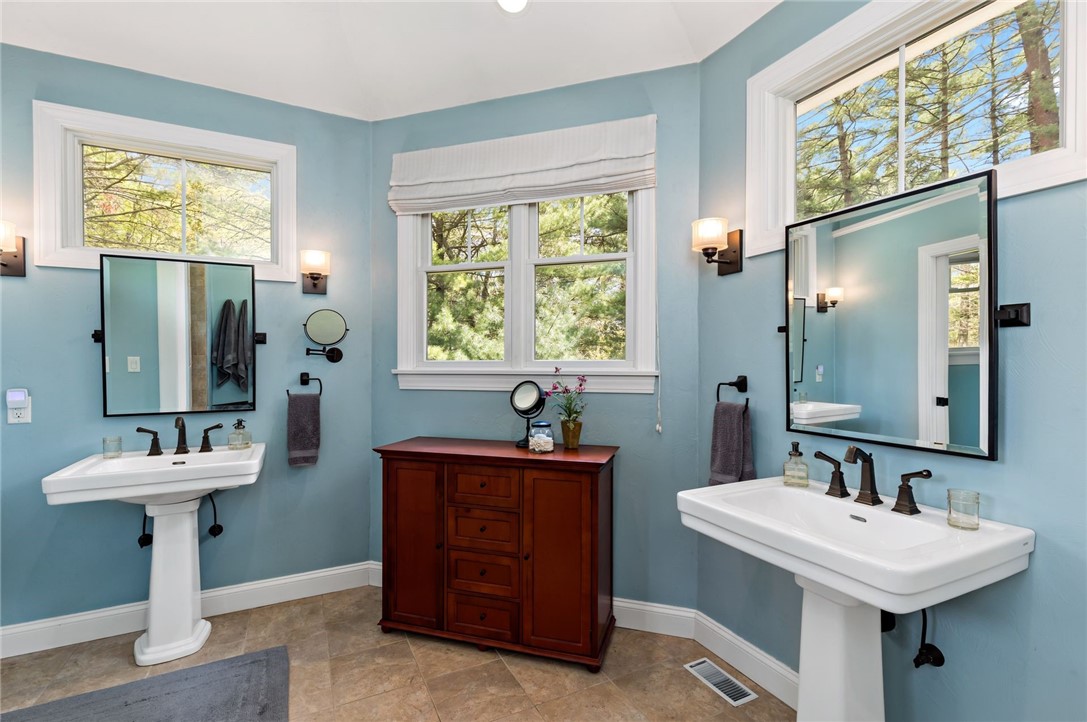 77 Raymonds Point Road Coventry, RI 02816 - Photo 36 of 50 Owner's suite bath with double vanities.