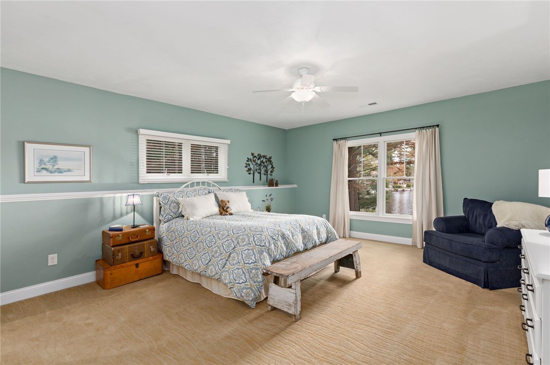 77 Raymonds Point Road Coventry, RI 02816 - Photo 45 of 50 Bedroom 3 on the lower level with views of Johnson's Pond.