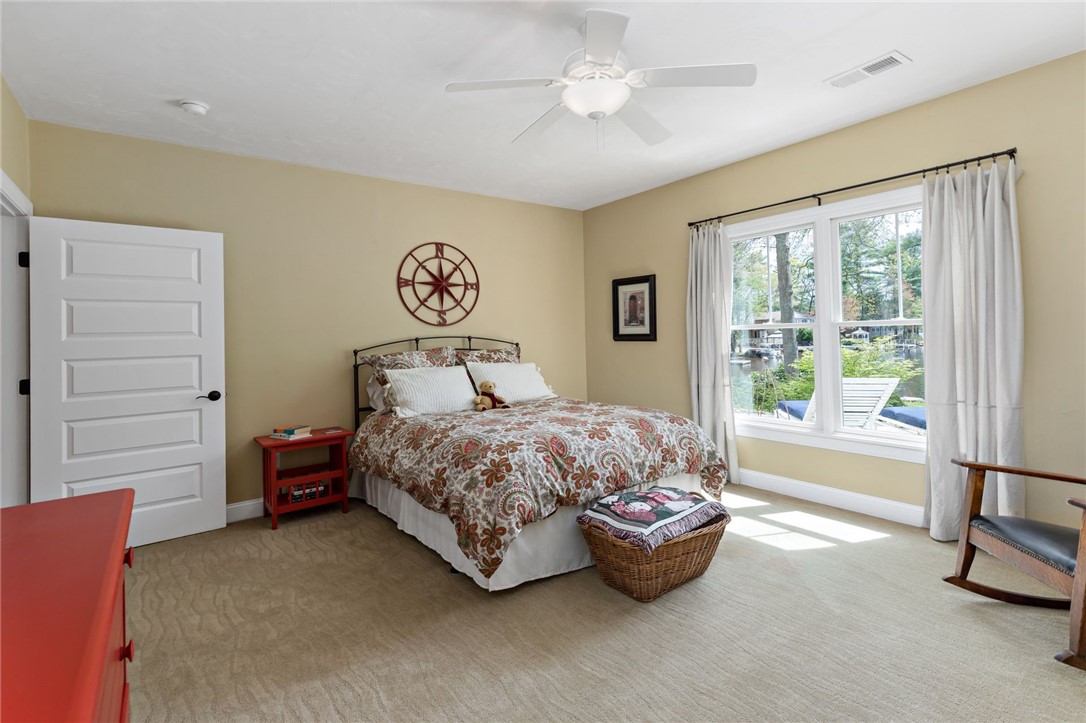 77 Raymonds Point Road Coventry, RI 02816 - Photo 47 of 50 Bedroom 4 on the lower level, with views of Johnson's Pond.