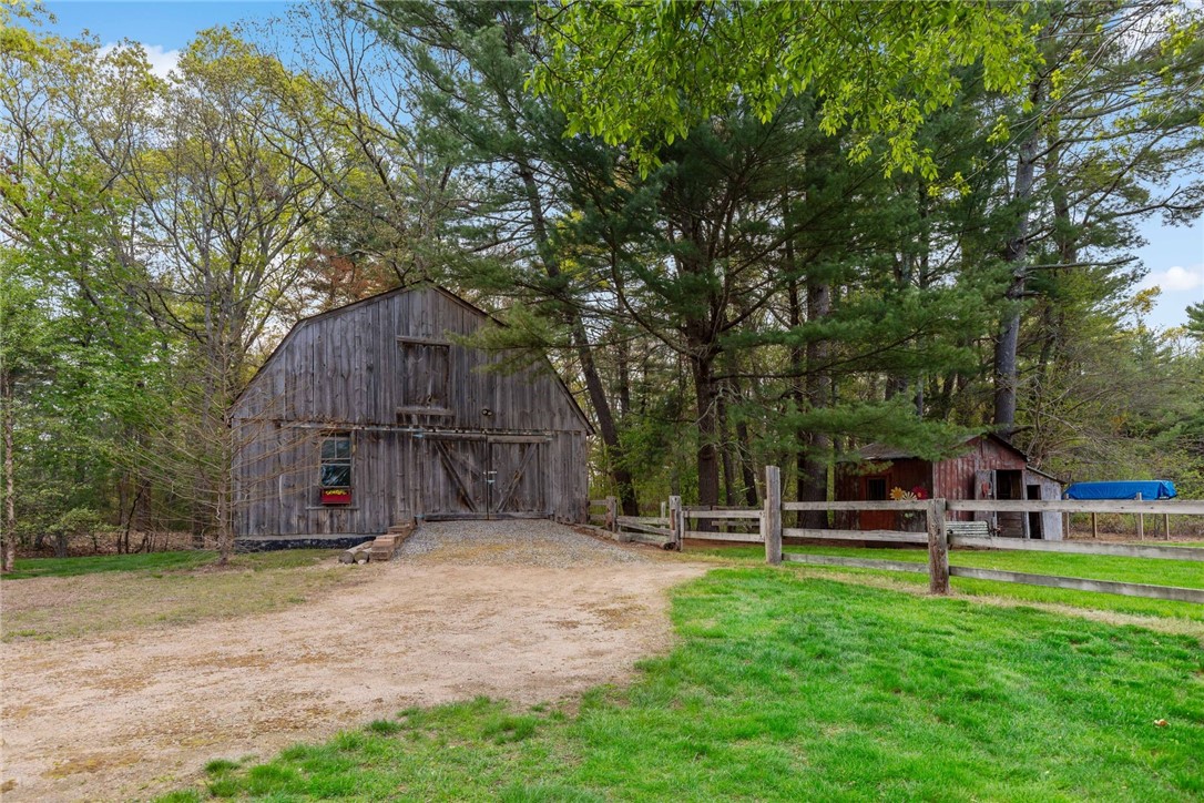 77 Raymonds Point Road Coventry, RI 02816 - Photo 48 of 50 Barn with lower level stalls, accessed via side driveway and barn doors.