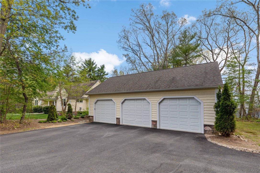 77 Raymonds Point Road Coventry, RI 02816 - Photo 6 of 50 Three other garage door bays.