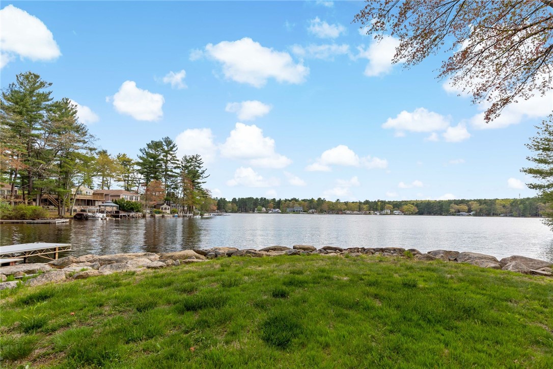 77 Raymonds Point Road Coventry, RI 02816 - Photo 8 of 50 Reconstructed retaining wall and view of the pond. Retaining wall was recently rebuilt with natural stone.