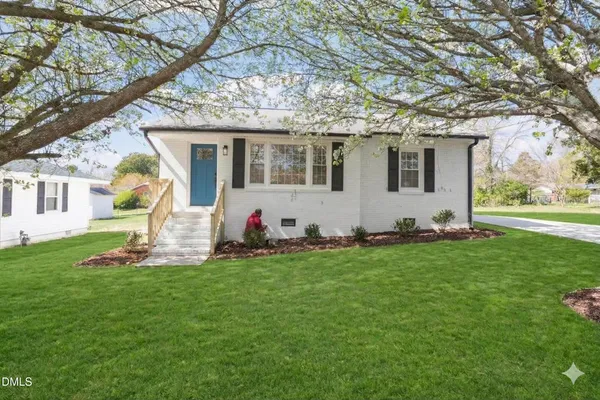 a front view of house with yard